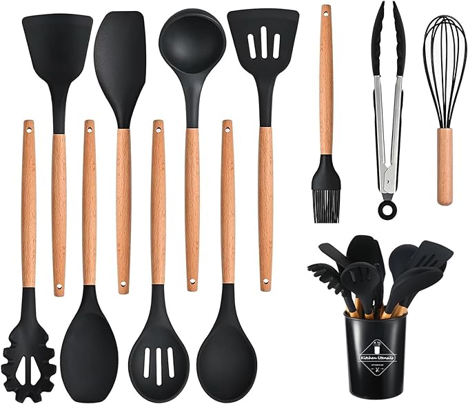 Set of black silicone kitchen utensils with wooden handles on a white background