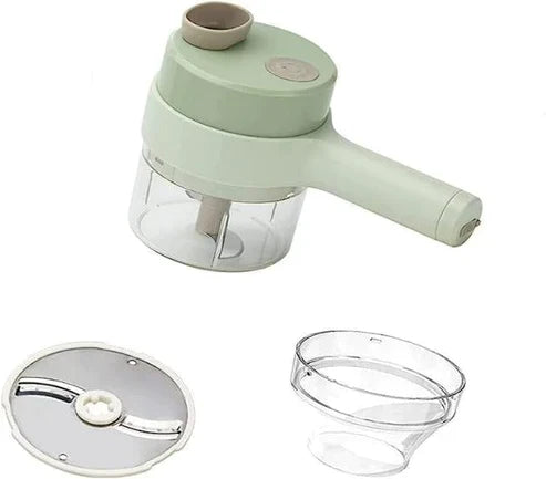 Green hand held food chopper with attachments on a white background