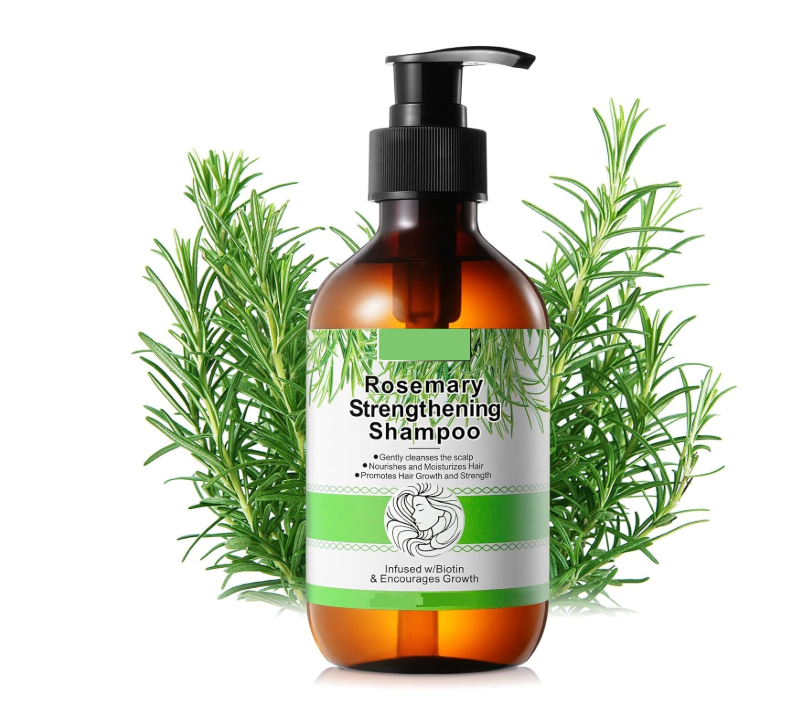 Bottle of Rosemary Strengthening Shampoo with rosemary leaves on a white background