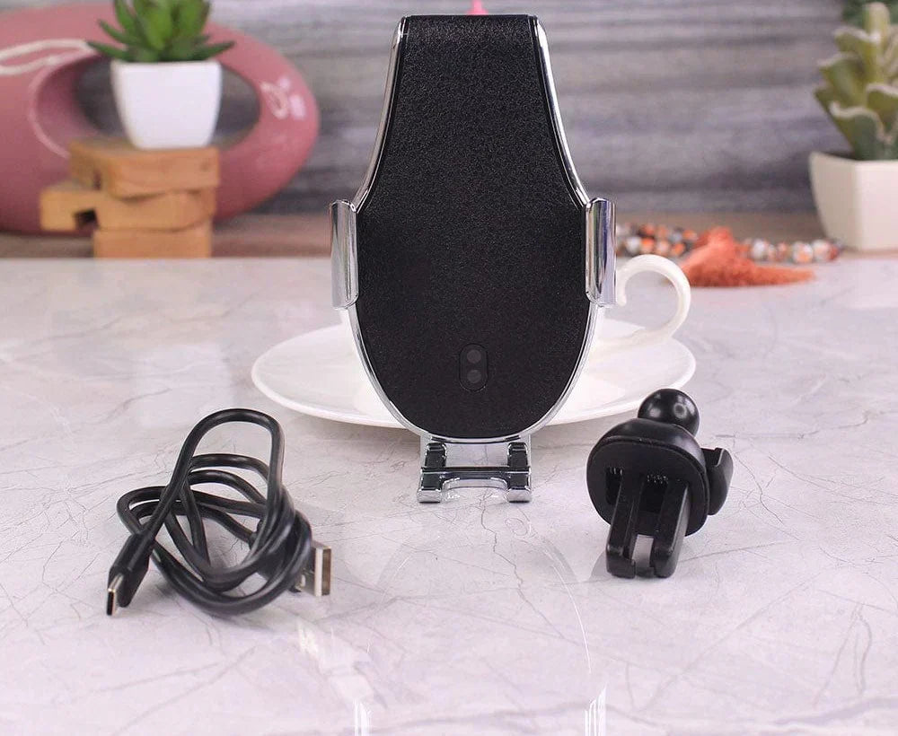 Phone holder with charging cable on a table