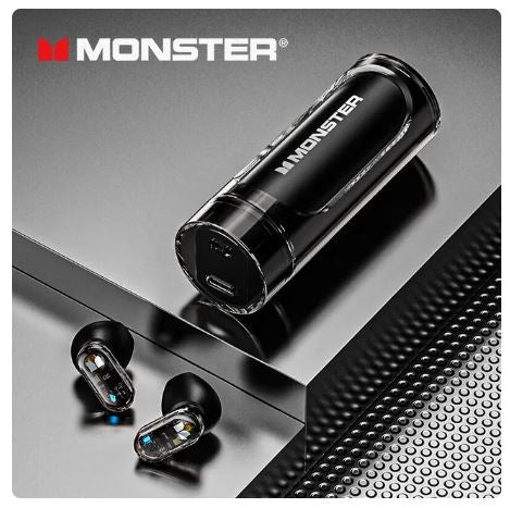 Black wireless earbuds with charging case on a metallic surface, featuring the Monster logo.