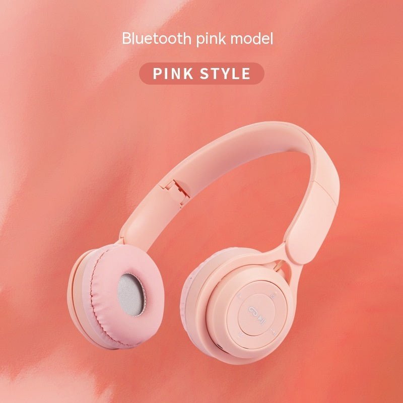 Pink Bluetooth headphones on a pink background with text indicating 'Pink Style'.