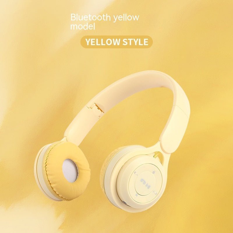 Yellow headphones on a yellow background with text indicating 'Bluetooth yellow model' and 'YELLOW STYLE'.