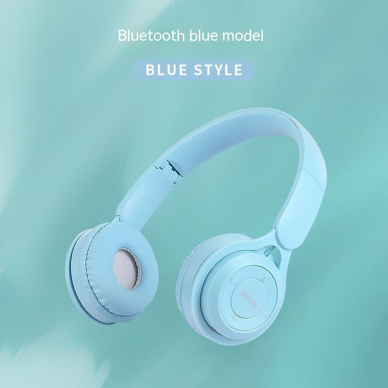 Light blue Bluetooth headphones on a matching light blue background with text indicating 'Blue Style'.